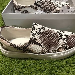 Snake print slip on sneakers